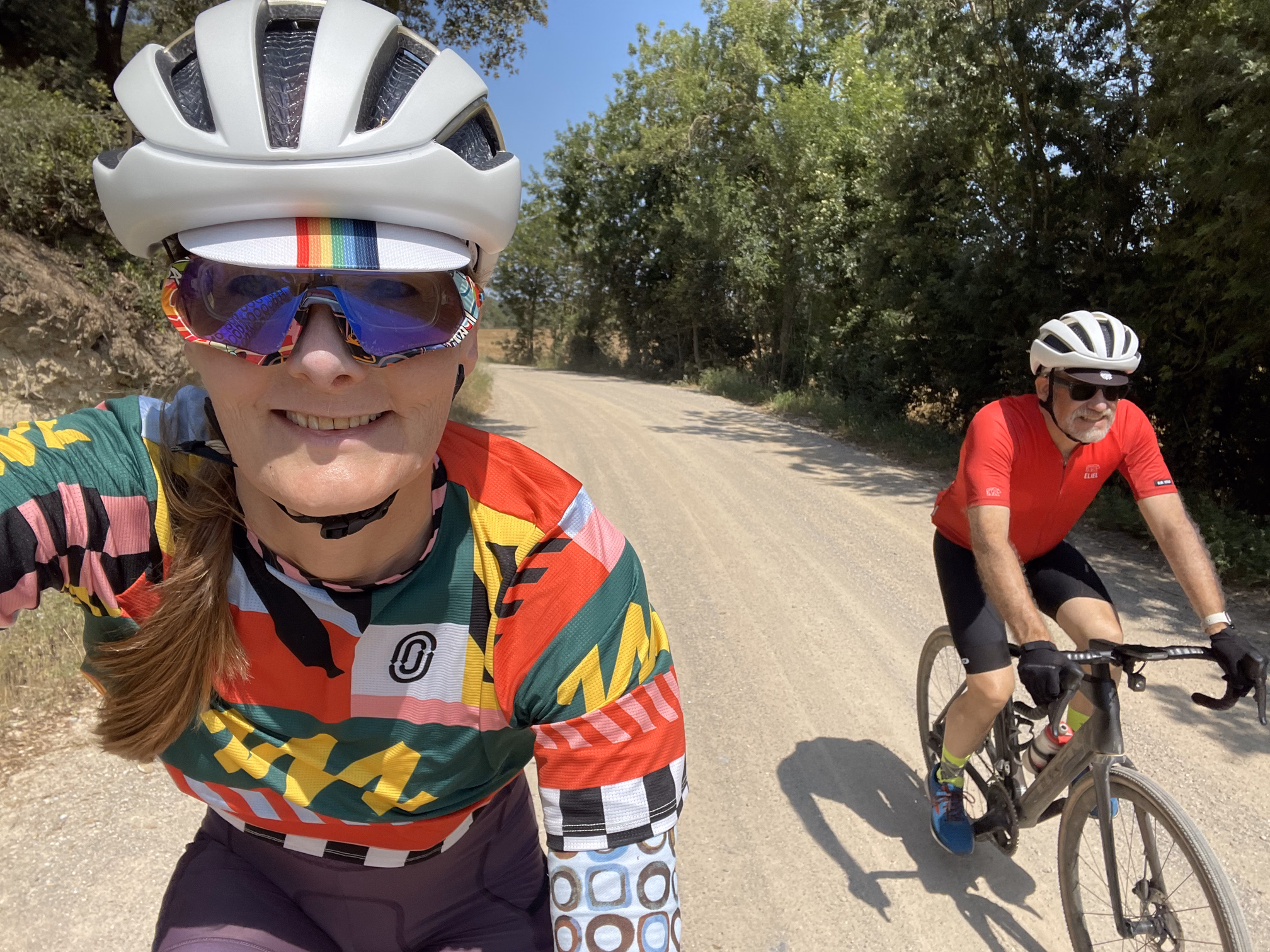 tracey & hunter biking dirt road