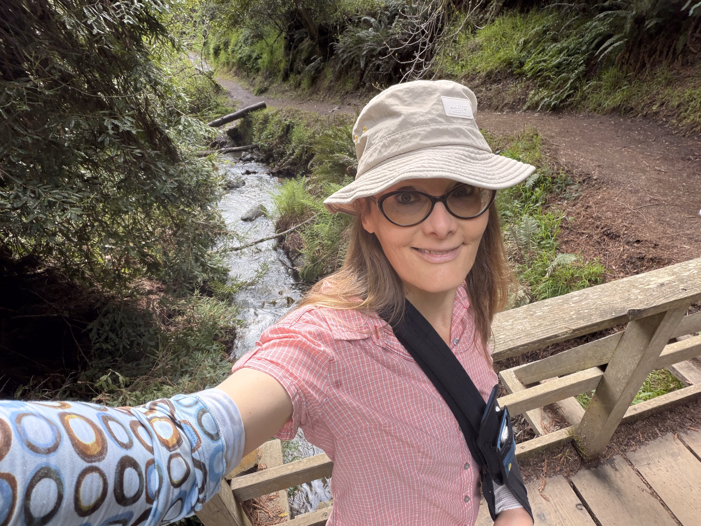 tracey on bridge over stream