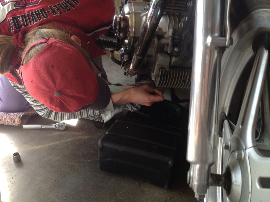 removing bottom bolt and filter removing bottom bolt and filter