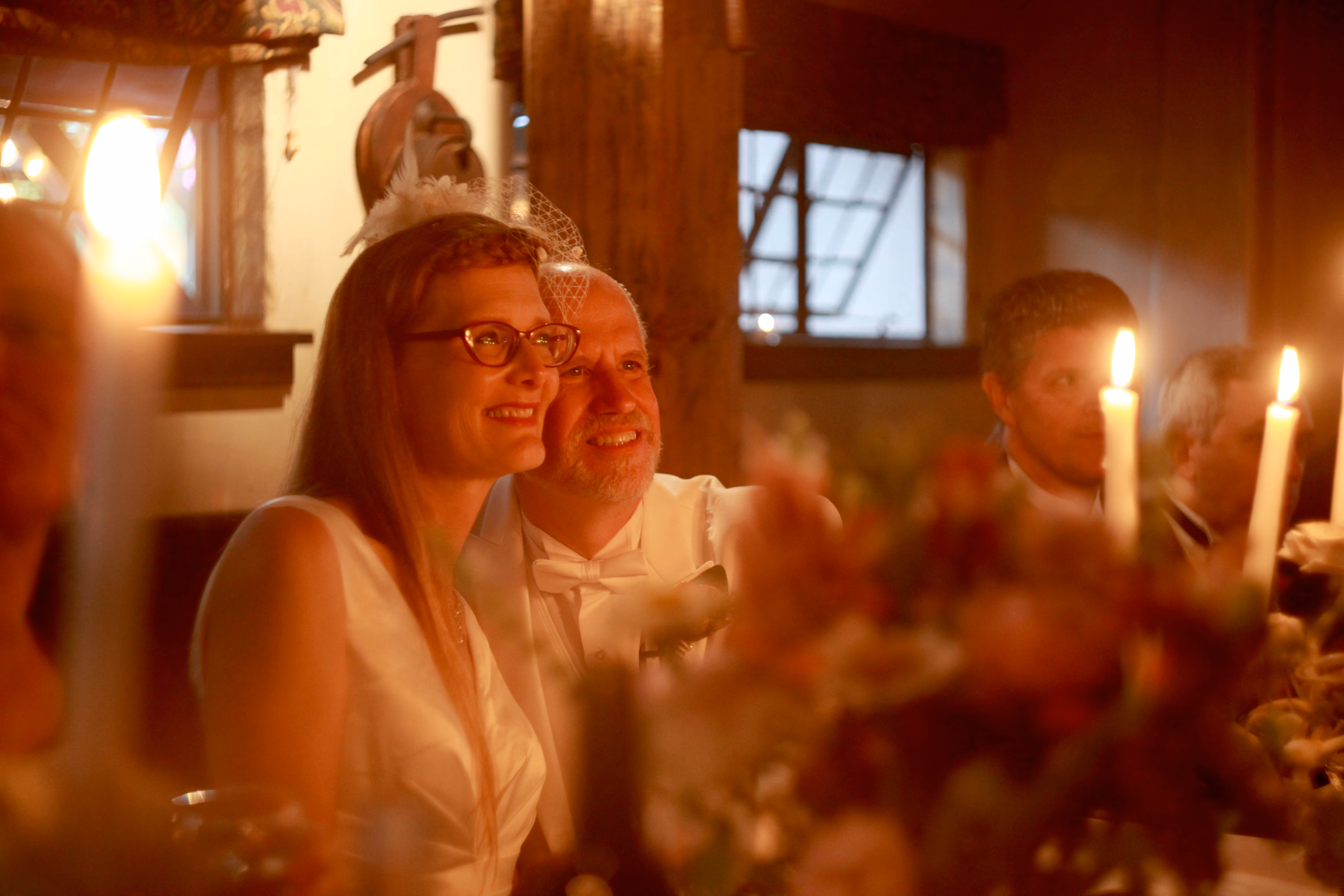 bride and groom, candlelit