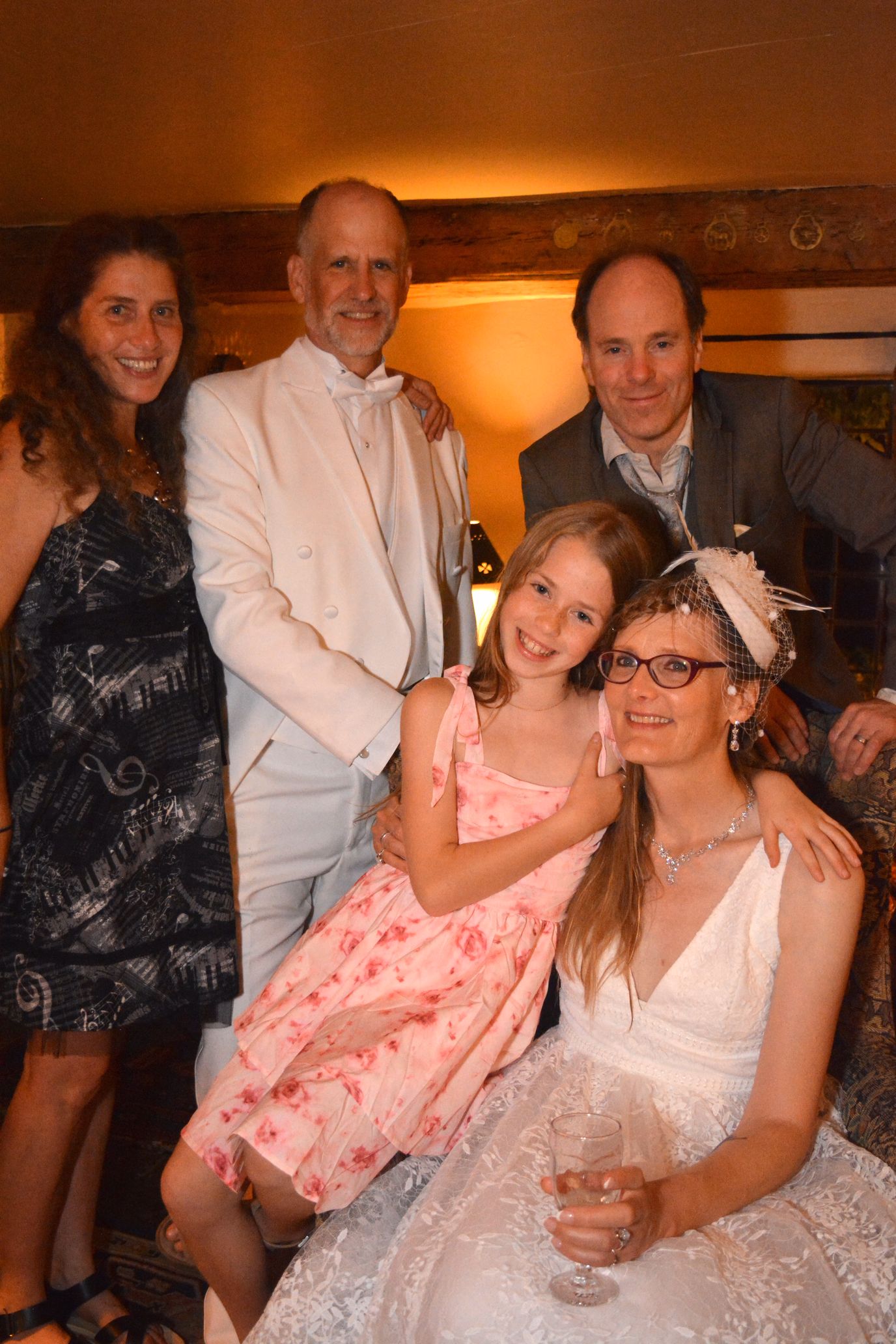 bride and groom with family