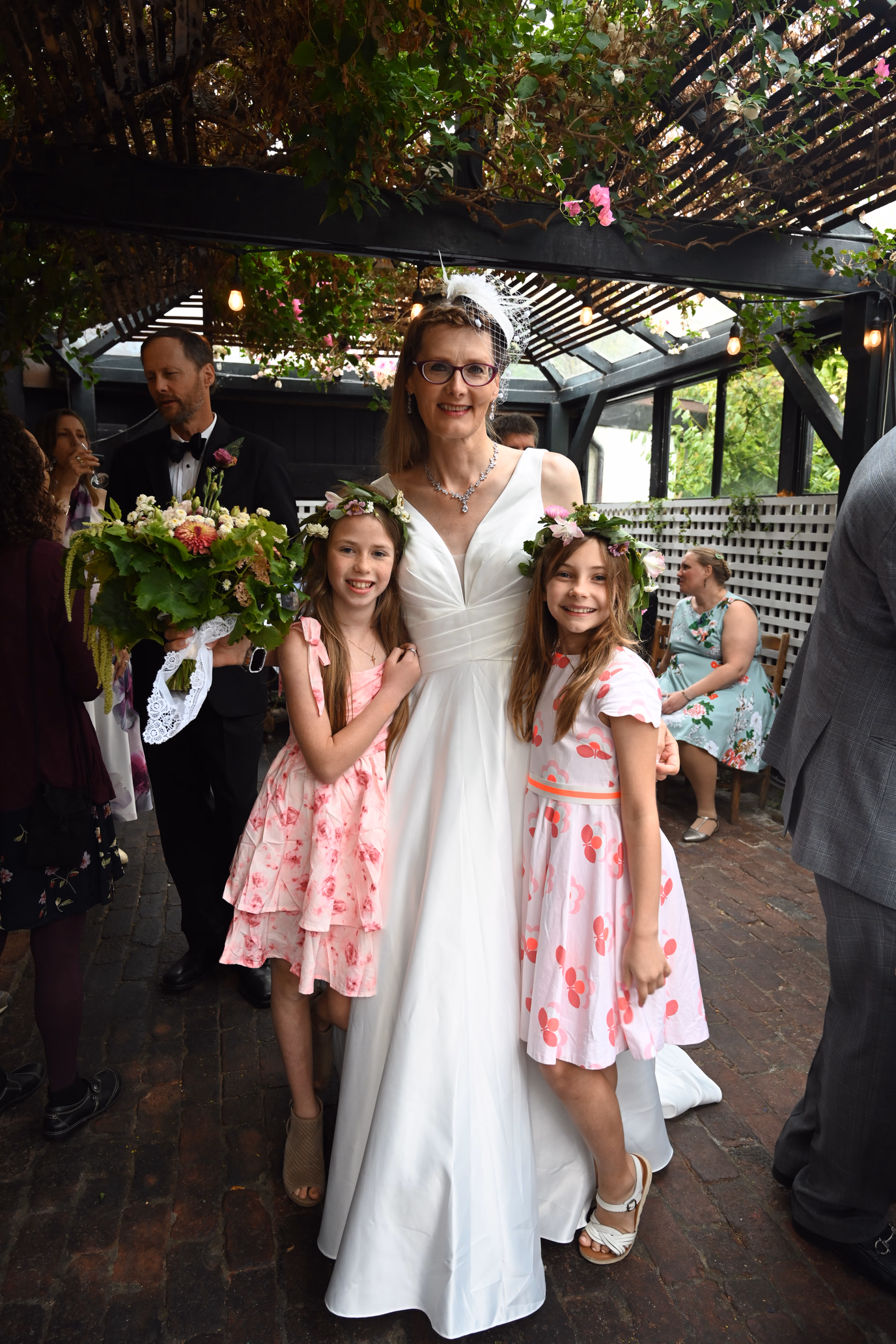 bride with flower girls