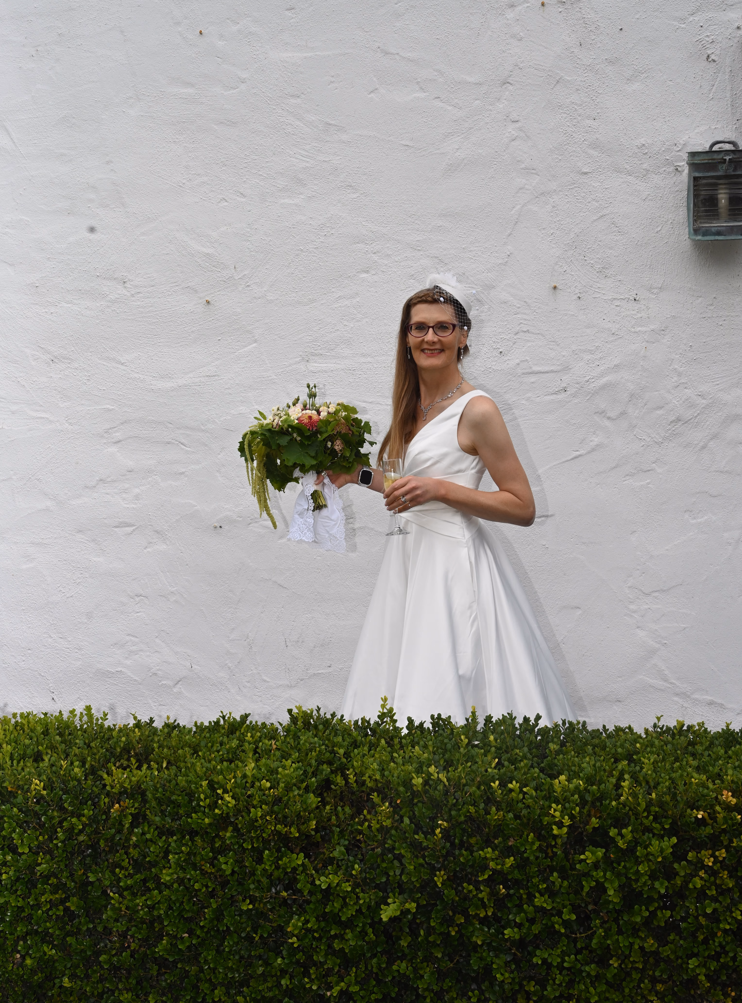 bride with hedge