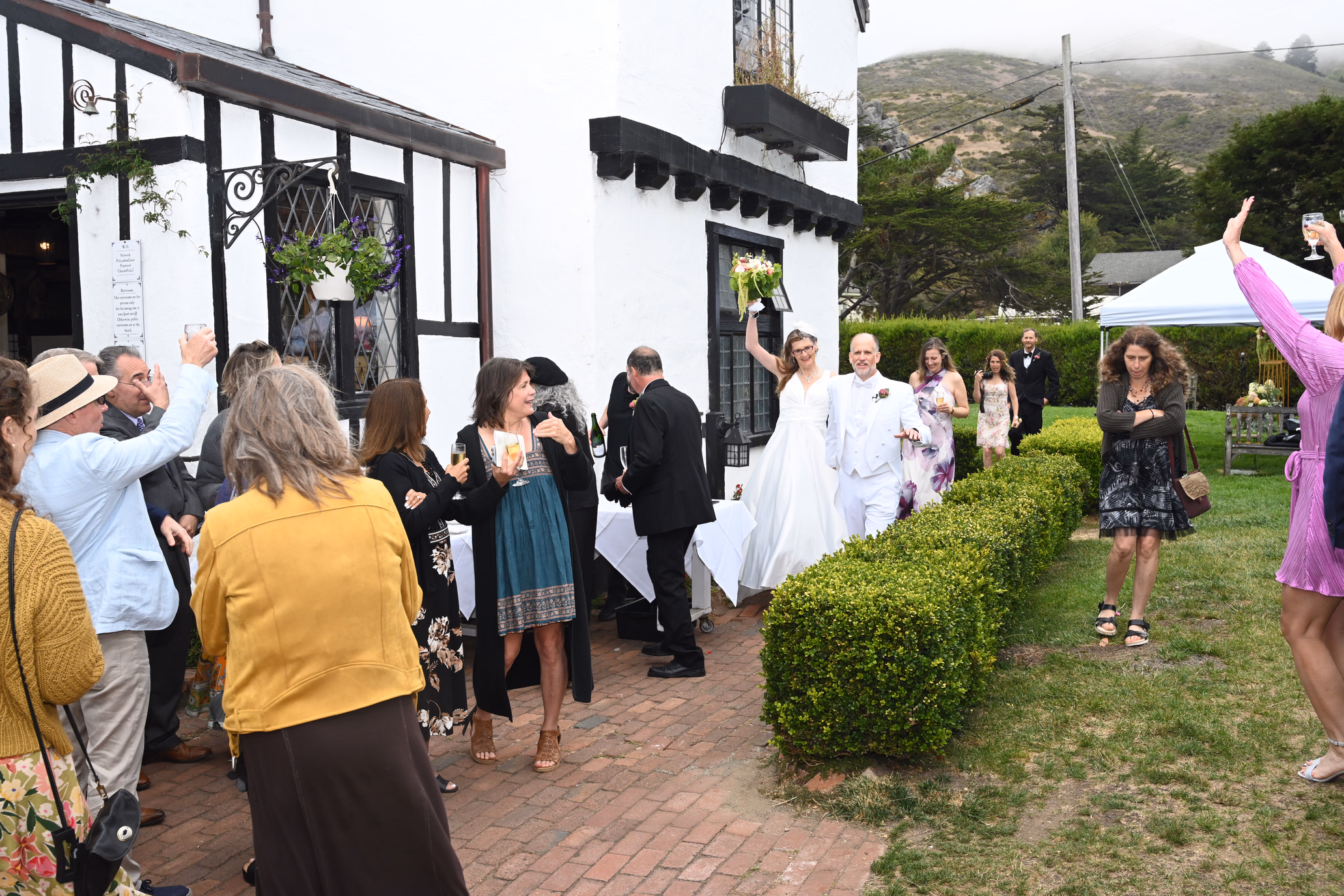 wedding couple celebrating with friends
